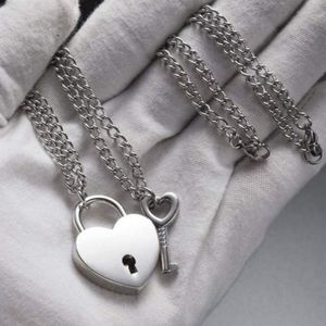 (2 necklaces) 1 heart padlock necklace AND 1 heart key necklace.  Lock opens